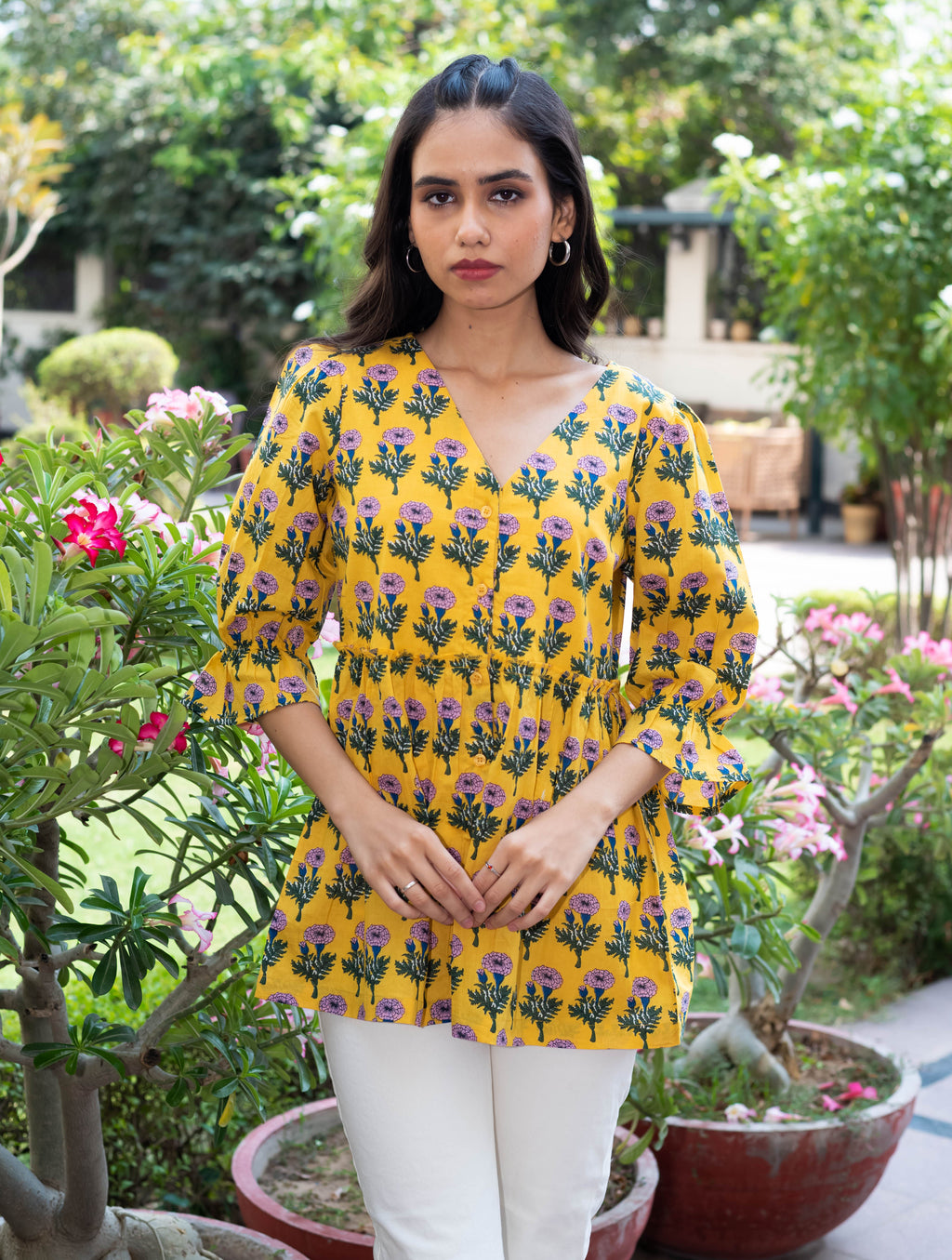 Yellow Floral Peplum Top with V-Neckline
