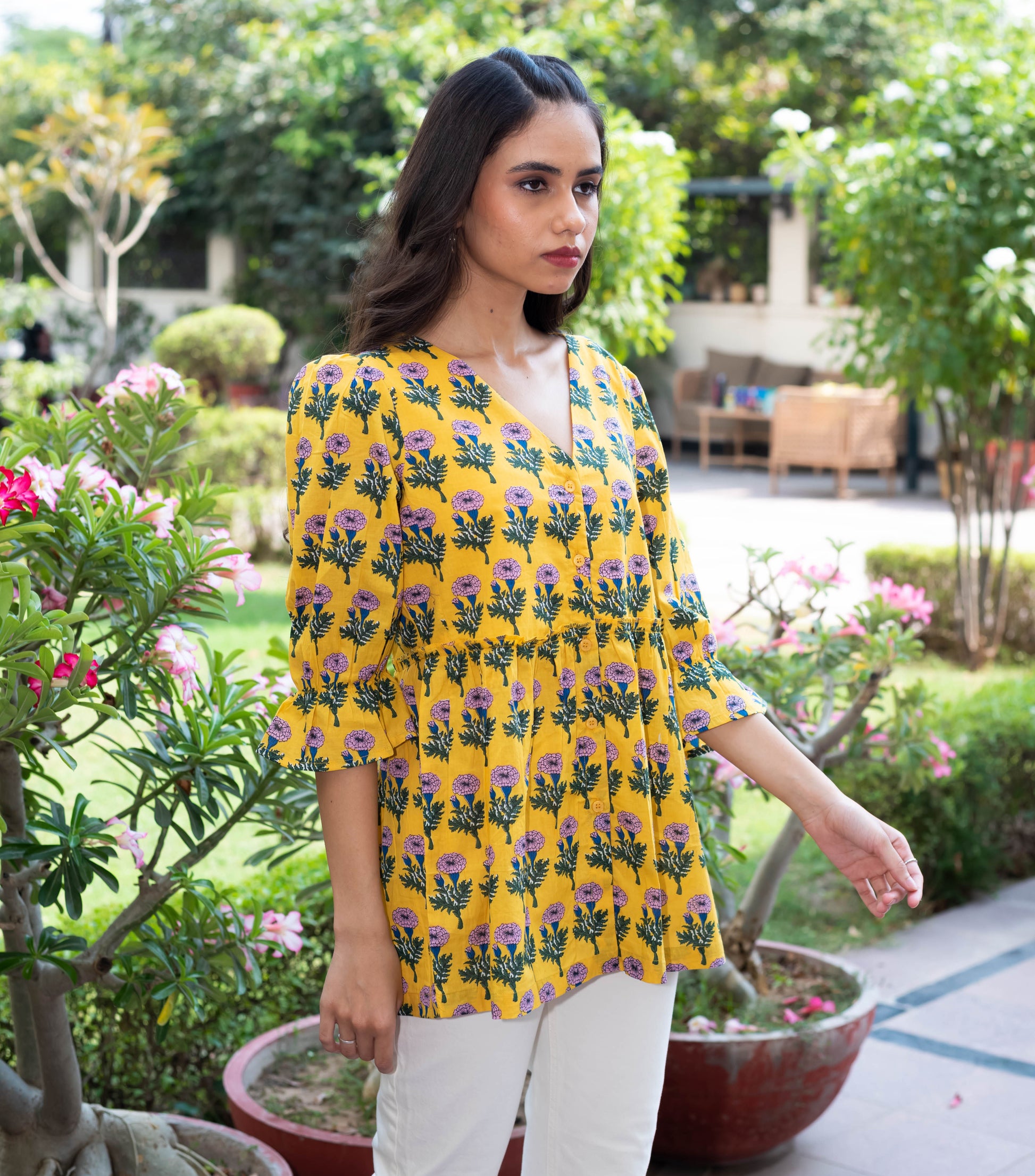 Yellow Floral Peplum Top with V-Neckline