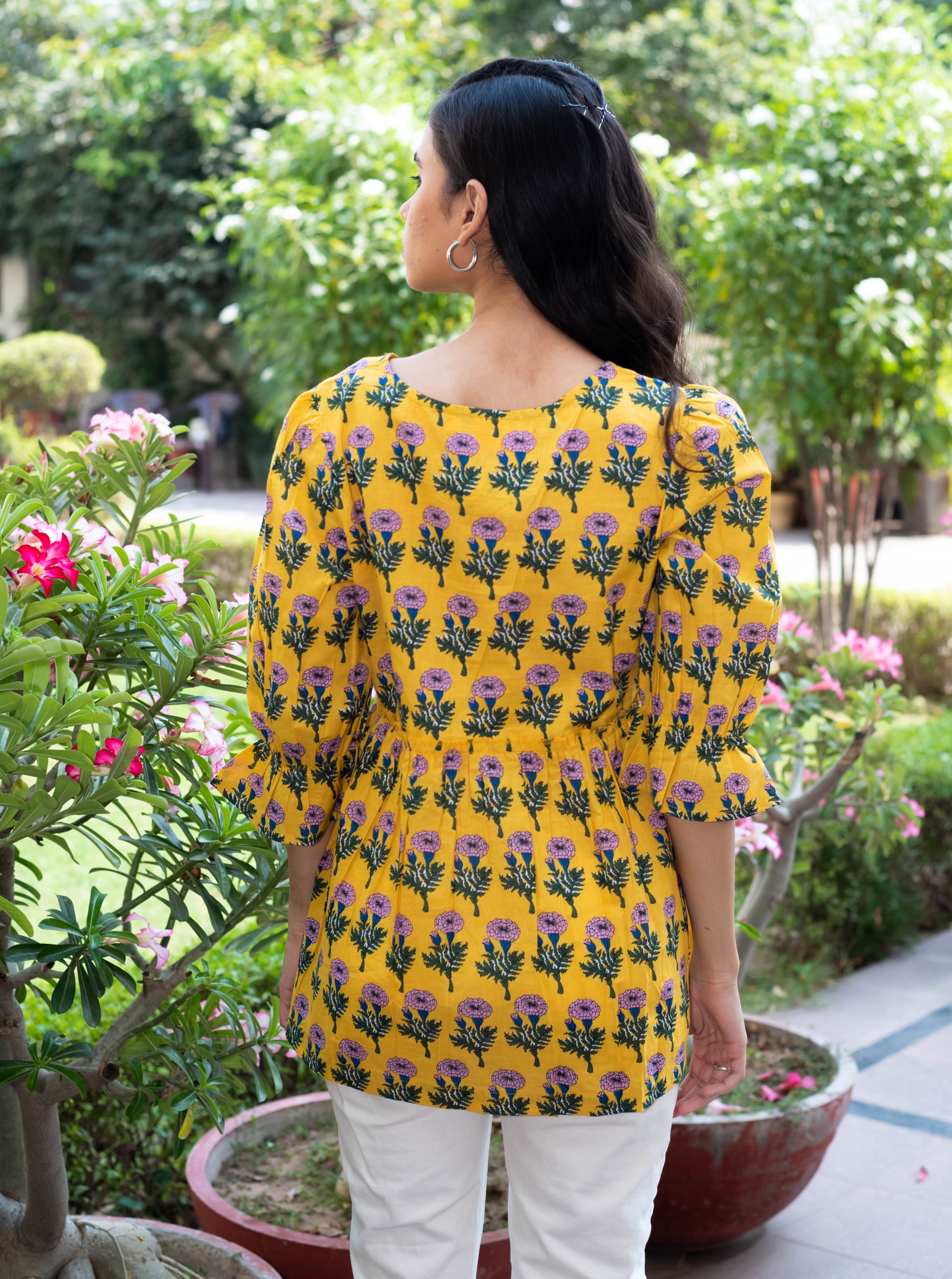 Yellow Floral Peplum Top with V-Neckline